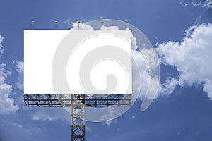 Blank big billboard against blue sky background,for your advertising,put your own text here,isolate white on board