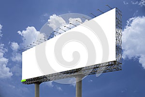 Blank big billboard against blue sky background,for your advertising,put your own text here,isolate white on board,clipping path