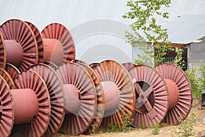 Blank big cable reels of metal for storing data cable.