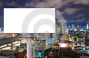 Blank billboard for advertisement in city downtown at night