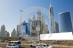 Blank billboard for advertisement at Dubai with skyline