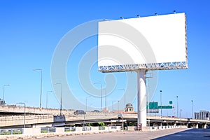 Blank billboard against blue sky for advertisement