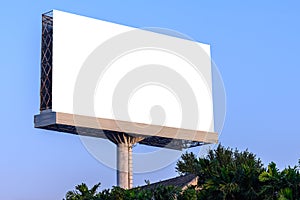 Blank billboard against blue sky for advertisement