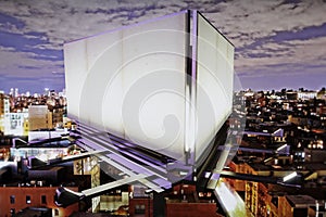 Blank billboard on the background of the city at night