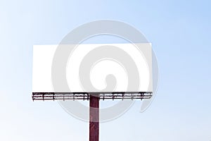 Blank billboard on blue sky background for marketing announcements.