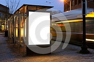 Blank billboard at bus stop