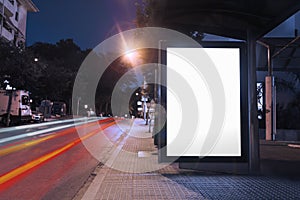 Blank billboard bus stop night with lights cars passing by. High quality and resolution beautiful photo concept