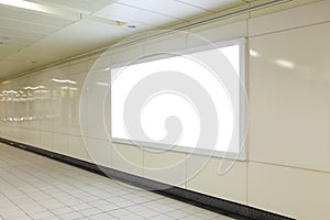 Blank billboard in metro station