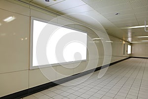 Blank billboard in metro station