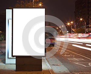 Blank billboard at night in the city Street