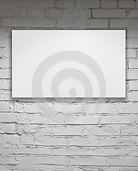 Blank billboard over white brick wall