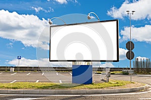 Blank billboard in a parking on a sunny day