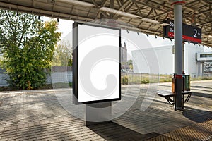 Blank billboard poster stand mock up on platform of raillway station