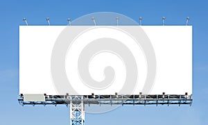 Blank billboard ready for new advertisement with blue sky backgr