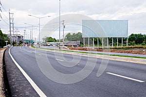 blank billboard on the sideway in the park. photo