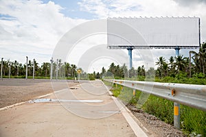 Blank billboard on the sideway in the park. image for copy space,