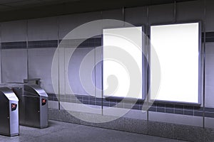 Blank billboard in subway or metro station, Useful for advertising.