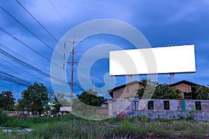 Blank billboard at twilight time ready for new advertisement