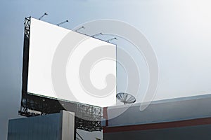 blank billboards in city with blue sky