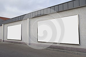 Blank billboards in a wall