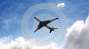 Blank black airplane mockup on sky background, bottom view