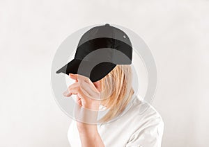 Blank black baseball cap mockup template, wear on women head