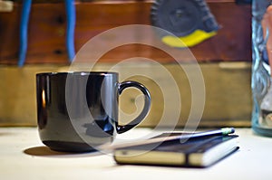 Blank black coffee mug tool table journal