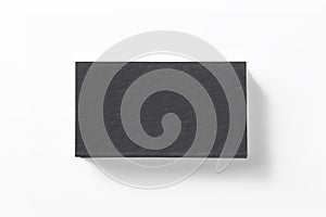 Blank black letterpress business cards stack isolated on white high view as template for design presentation, logo embossing, mock