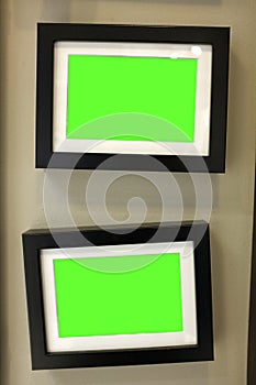 Blank black picture frame template set hanging on wall