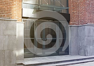 Blank black rectangular box store entrance mockup, glass brick wall