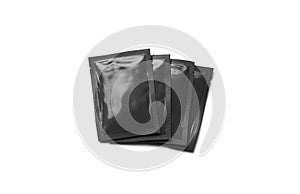 Blank black sachet packets stack mock up, isolated, top view