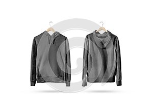 Blank black sweatshirt mockup set hanging on wooden hanger photo