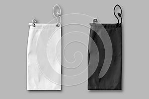 Blank black and white fabric pouch case bag for glasses. mockup isolated on a grey background.