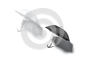Blank black and white open umbrella mockup lying, top view