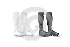 Blank black and white soccer boots with socks pair mockup