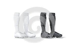 Blank black and white soccer boots with socks pair mockup photo