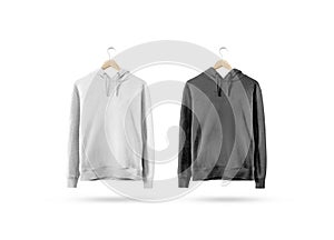 Blank black and white sweatshirt mockup hanging on wooden hanger