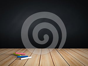 Blank blackboard with chalks