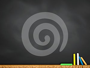 Blank blackboard with chalks