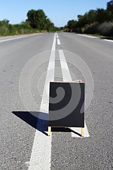 blank blackboard on the road