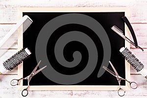 Blank blackboard and scissors hairdresser set