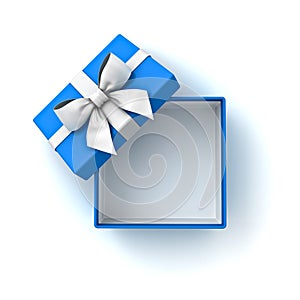 Blank blue gift box or top view of open blue present box with white ribbon and bow isolated on white background with shadow