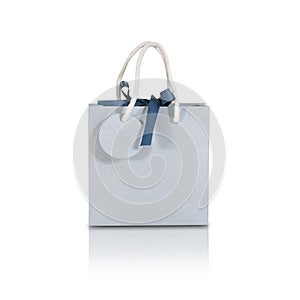 Blank blue paper gift bag mock up standing on isolated on white