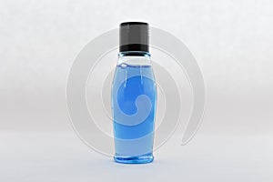 Blank  bottle, blue liquid