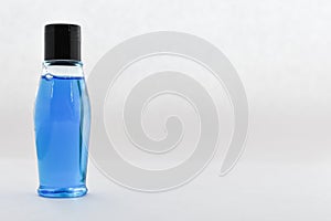 Blank  bottle, blue liquid