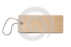 Blank brown cardboard price tag or label with thread isolated