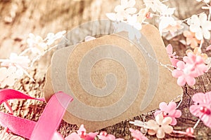 Blank brown gift tag with dainty spring blossom