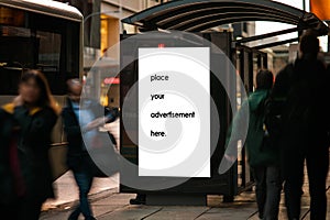 Blank bus shelter advertising boardat twighlight photo