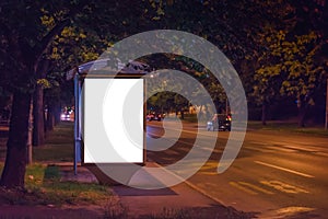 Blank Bus Station Billboard at Night