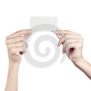 Blank business card in a female hand. Concept